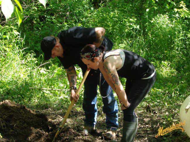 Chico and wife Cassondra working in tv show Moonshiners