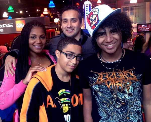 Image of Trina Braxton with her ex husband Gabe and with their kids