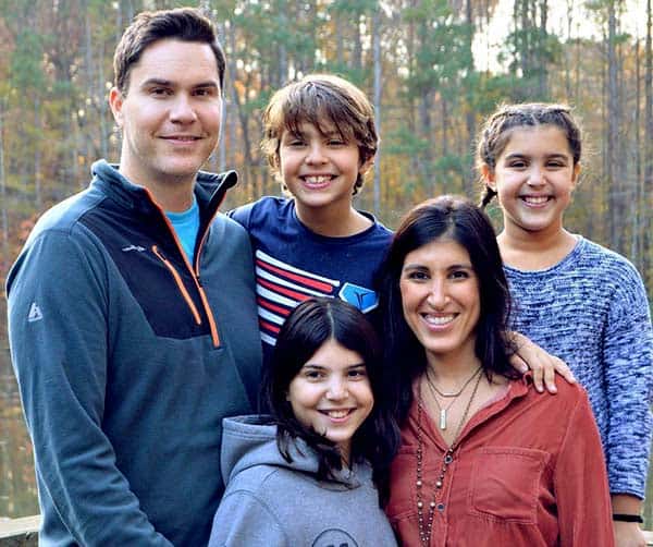 Image of Ken Corsini with his wife Anita Corsini and with their kids
