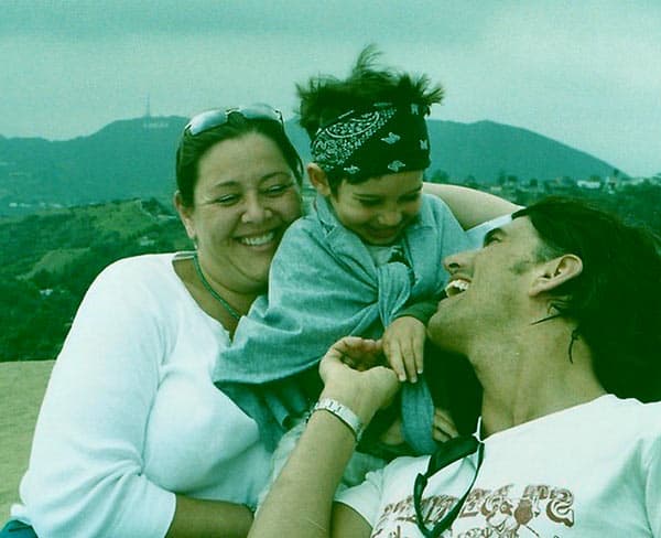 Image of Jeffrey Brezovar (father), Milo Manheim (as a child) & Camryn Manheim (mother)